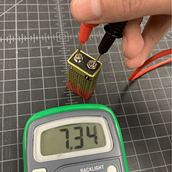 Voltage reading of 9v battery reading 7.34v