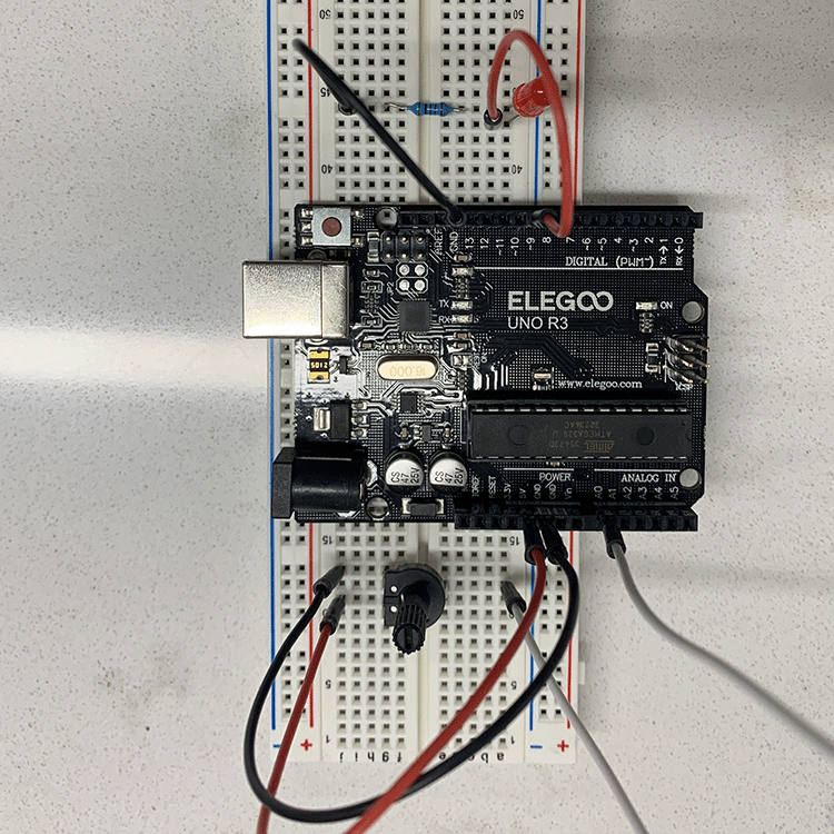 Photo of new breadboard layout w/ LED and potentiometer