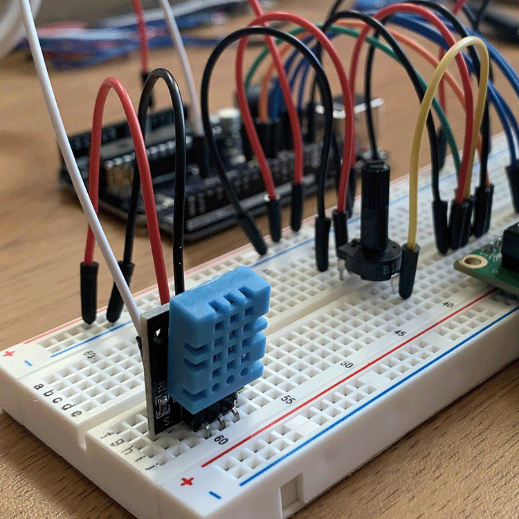 Close-up photo of DHT11 Sensor connected to breadboard with LCD Display